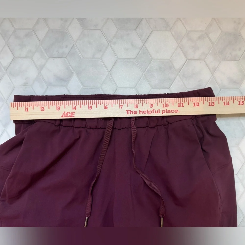 Lululemon On the Fly 7/8 Pants Dark Adobe Maroon Size 4 EUC